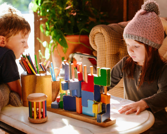 Blocks vs. Screens: Why Stacking Towers Beats Virtual Worlds for Growing Minds
